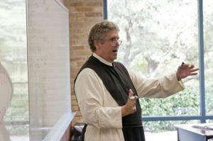 Fr. Gregory teaching English.