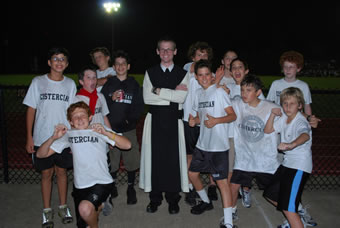 Br. Stephen captains a band of middle school students for the annual Dot Race.